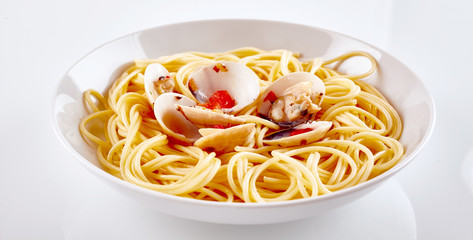 Gourmet Paella Pasta with Shells on White Plate