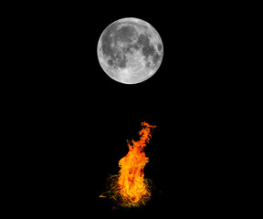 Moon and bonfire in the night