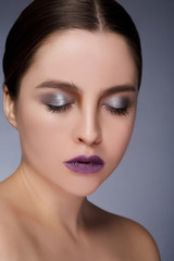 Fototapeta premium Portrait of beautiful sexy girl with bright makeup close-up