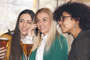 group of friends with mobile phone