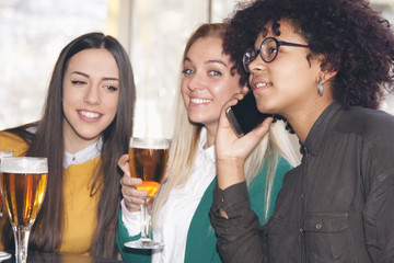 group of friends with mobile phone