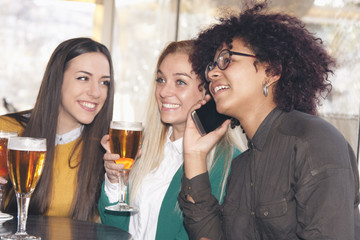 group of friends with mobile phone