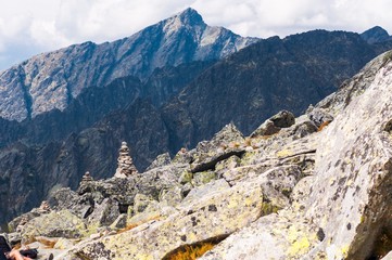 View of mountains from Solisko in High Tatras in Slovakia. Stacked zen style rocks in foreground