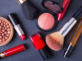 Decorative cosmetics on black background