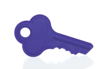 purple key isolated over white background