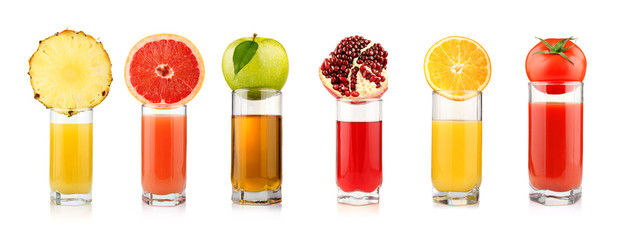 Set of tropical fruit juices in glasses isolated