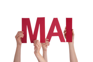 People Holding Straight German Word Mai Means May