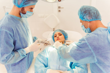 Team surgeons at work