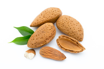 Almonds with leaves isolated on white background