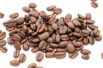 Coffee grains and leaves isolated on the white backgrounds.