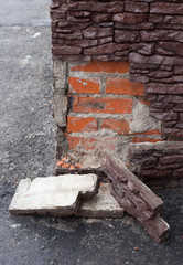 the collapse of the walls of the house facade