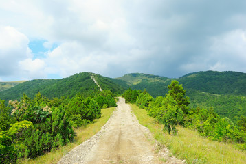 Naklejka na ściany i meble The stony road in the Caucasus mountains, Kabardinka, Russia