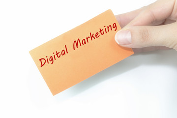 hand holding orange card written digital marketing. over isolated on white