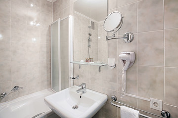 Interior of a modern hotel bathroom.