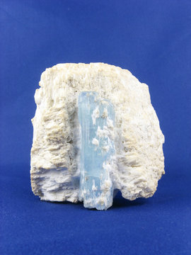 14cm blue aquamarine crystal on albite, Balachi, Northern Provinces, Pakistan. Birthstone for March, faceted for jewellery  and used in crystal healing and metaphysics