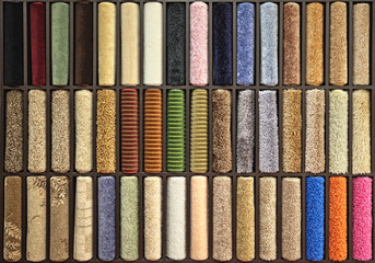 samples of multi-colored carpets 