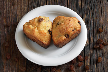 Two muffins with raisins
