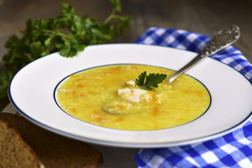 Millet soup with chicken and fried vegetable.