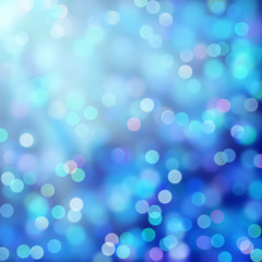 glittery bokeh background in blue, white and purple