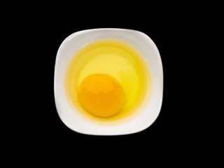 fresh egg in a bowl.