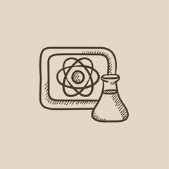 Atom sign drawn on board and flask sketch icon.