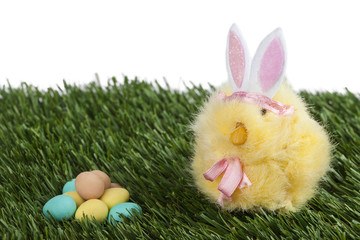 yellow rabbit with colorful eggs