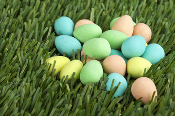 colorful easter egg lying on the grass