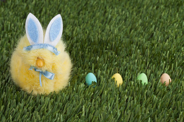 blue bunny with four easter eggs