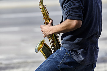 Young Man playing a Saxophone