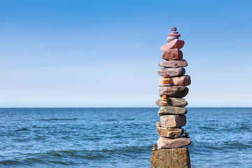 Fototapeta na wymiar Concept of balance and harmony. Rocks zen on the sea.
