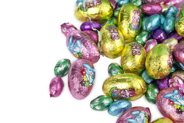 colorful chocolate eggs on a white background