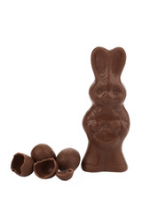 chocolate bunny candy beside the chocolate eggs