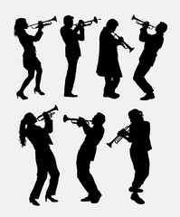 Trumpet instrument music player silhouette. Good use for symbol, logo, web icon, mascot, sticer, or any design you want. - obrazy, fototapety, plakaty