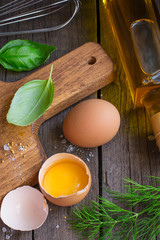 Ingredients for mayonnaise sauce: eggs, olive oil, spices