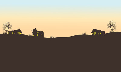 Silhouette of house in field