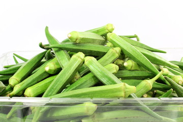 fresh Lady Fingers or Okra in white background