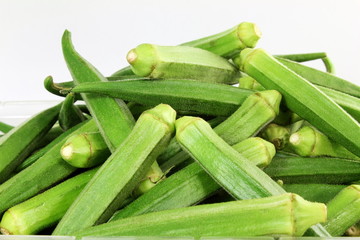 fresh Lady Fingers or Okra in white background