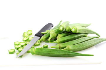 fresh Lady Fingers or Okra in white background