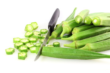 fresh Lady Fingers or Okra in white background