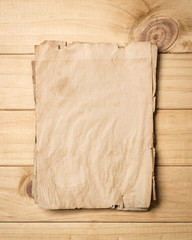 Stack of old papers put on wood.