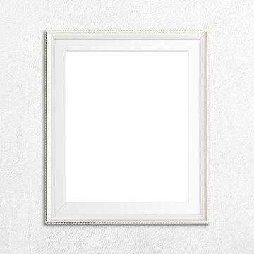 White picture frame on white wall.