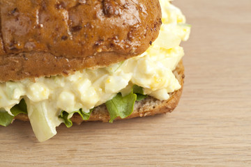 sandwich with scrambled egg and lettuce