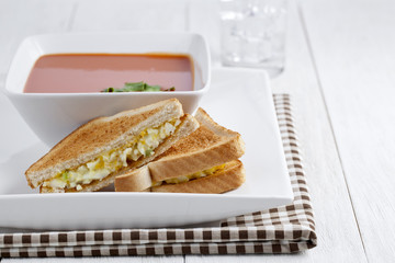 egg sandwich and tomato soup bowl