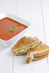 creamy tomato soup and sandwich