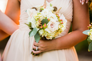 Obraz na płótnie Canvas Bridesmaid holding beautiful pastel pink rustic bouquet.