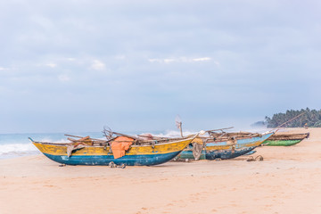 Obraz premium Tropical seascape with a boats on the beach