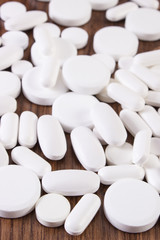 White medical pills and capsules, health care concept