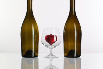 Two bottles and a glass of cognac
