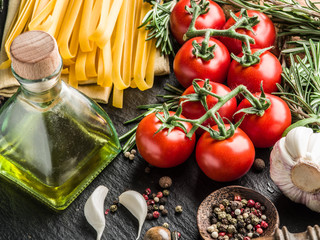 Tomatoes, spaghetti pasta and spices.
