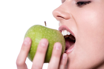 Woman eating an apple